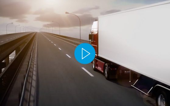 video screenshot of a semi-truck driving down a highway